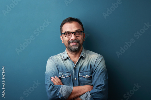 Portrait of a smiling man of Indian origin © AJay