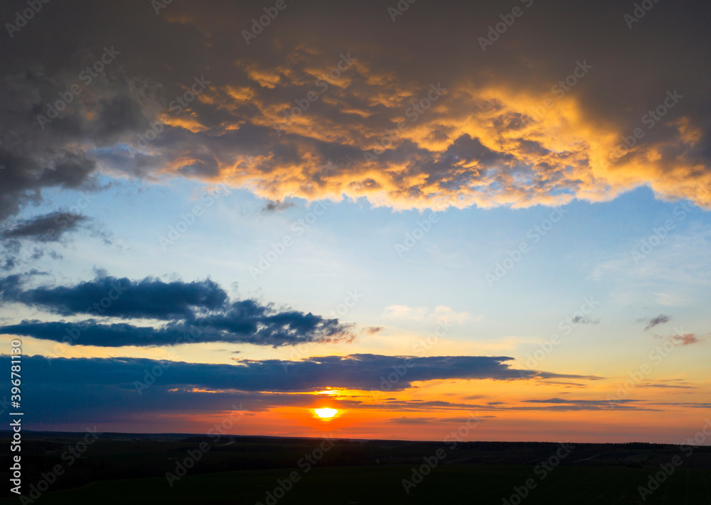 Clouds at sunset, amazing sky, nature background