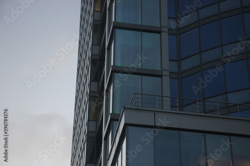 Modern glass silhouettes on modern building.