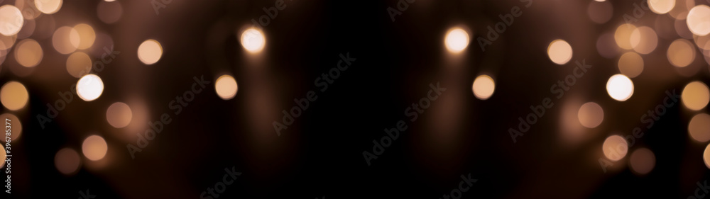 Beautiful festive bokeh on a black background golden circles, light night bokeh effect, deflated. Festive postcard, night view. Beautiful festive bokeh on a black background golden circles, light night bokeh effect, deflated. Festive postcard, night view.