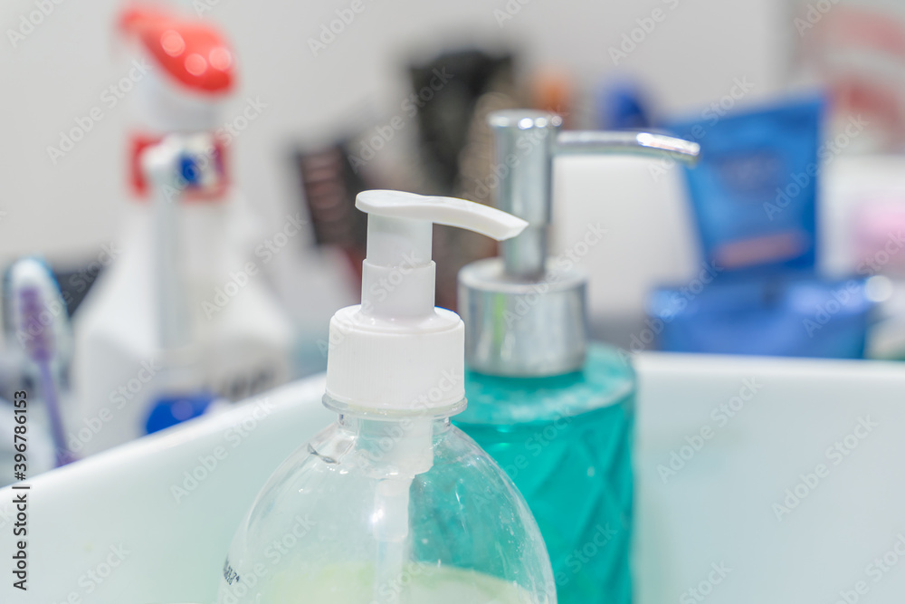 the sanitizer is in the bathroom close up the sanitizer is in the bathroom close up