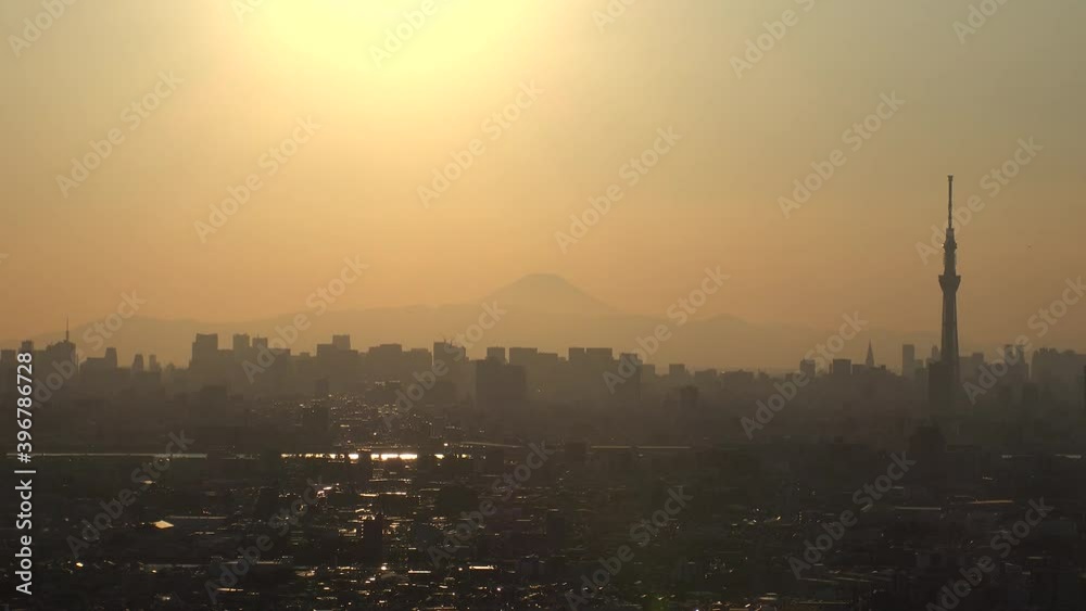 TOKYO, JAPAN : Aerial high angle sunrise or sunset view of CITYSCAPE of TOKYO. View of buildings at central downtown area. Japanese nature and city life concept shot. TOKYO, JAPAN : Aerial high angle sunrise or sunset view of CITYSCAPE of TOKYO. View of buildings at central downtown area. Japanese nature and city life concept shot.