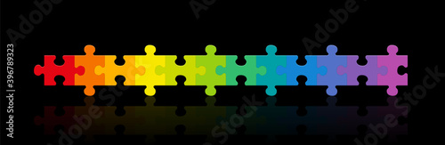 Jigsaw puzzle row, rainbow gradient colored puzzle pieces, twelve different colors in a line. Isolated vector illustration on black background.
