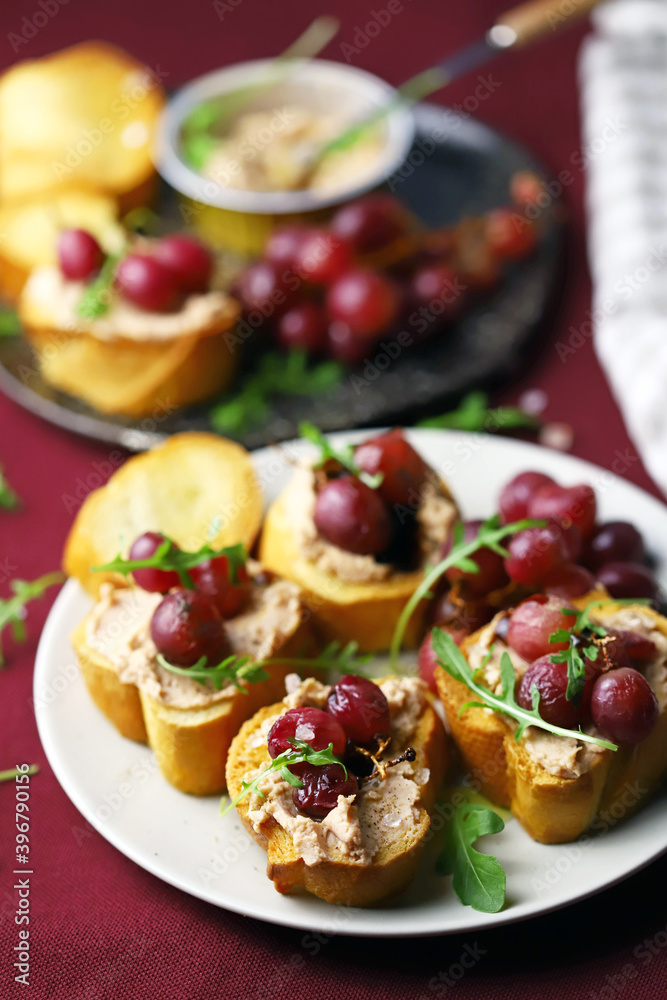 Soft focus. Canapé with pate and grapes. Delicious and healthy snack. Soft focus. Canapé with pate and grapes. Delicious and healthy snack.
