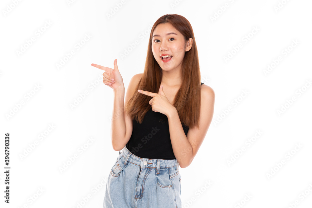 Portrait young beautiful Asian woman happy smile on isolated white background. Beautiful Asian girl smiling and with hand sign and copy space. Casual woman, Asian student smiling looking happy. Portrait young beautiful Asian woman happy smile on isolated white background. Beautiful Asian girl smiling and with hand sign and copy space. Casual woman, Asian student smiling looking happy.