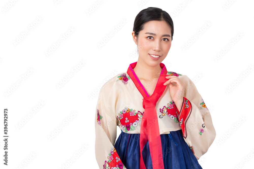 Young woman wearing Korean traditional dress. Women wearing hanbok isolated on white background. Young Korean girl wearing traditional dress, Korean National costume on white background. Young woman wearing Korean traditional dress. Women wearing hanbok isolated on white background. Young Korean girl wearing traditional dress, Korean National costume on white background.