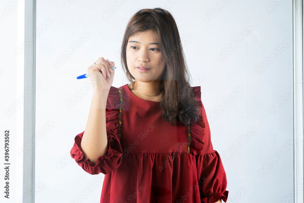 Asian Business woman concentrating on the mirror in happiness action at office or coworking space,banner and cover design,startup and entrepreneur,workshop and strategy concept Asian Business woman concentrating on the mirror in happiness action at office or coworking space,banner and cover design,startup and entrepreneur,workshop and strategy concept