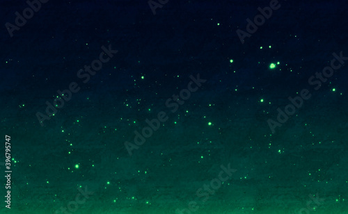 ホタルの光と草むらの抽象的な背景イメージ素材