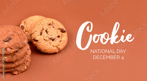 National Cookie Day stock images. Cookies on a brown background stock images. Sweet chocolate and sugar cookies images. American sweet biscuits photo. Cookie Day Poster, December 4. Important day