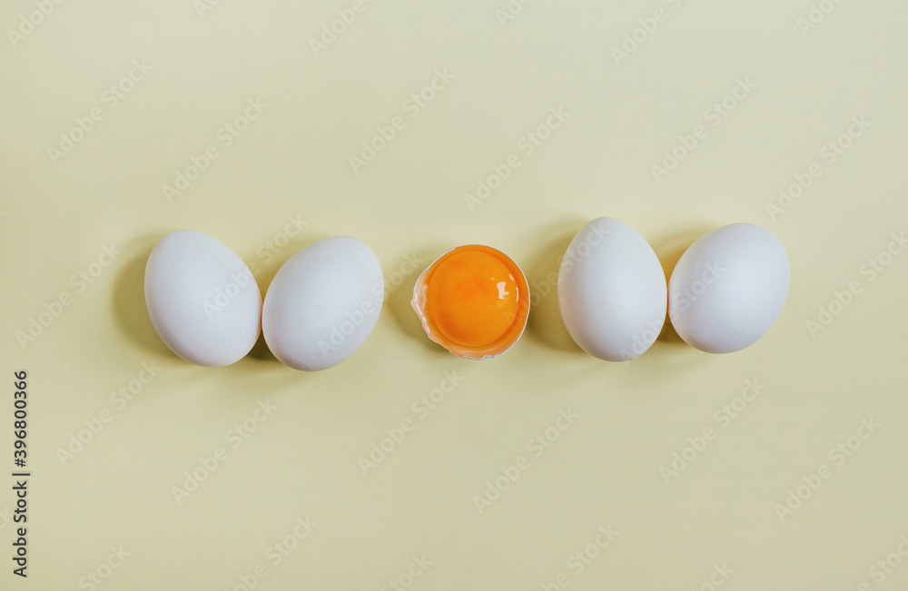 .top view of eggs on yellow background