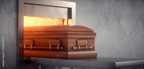 Coffin being cremated in a crematorium. photo