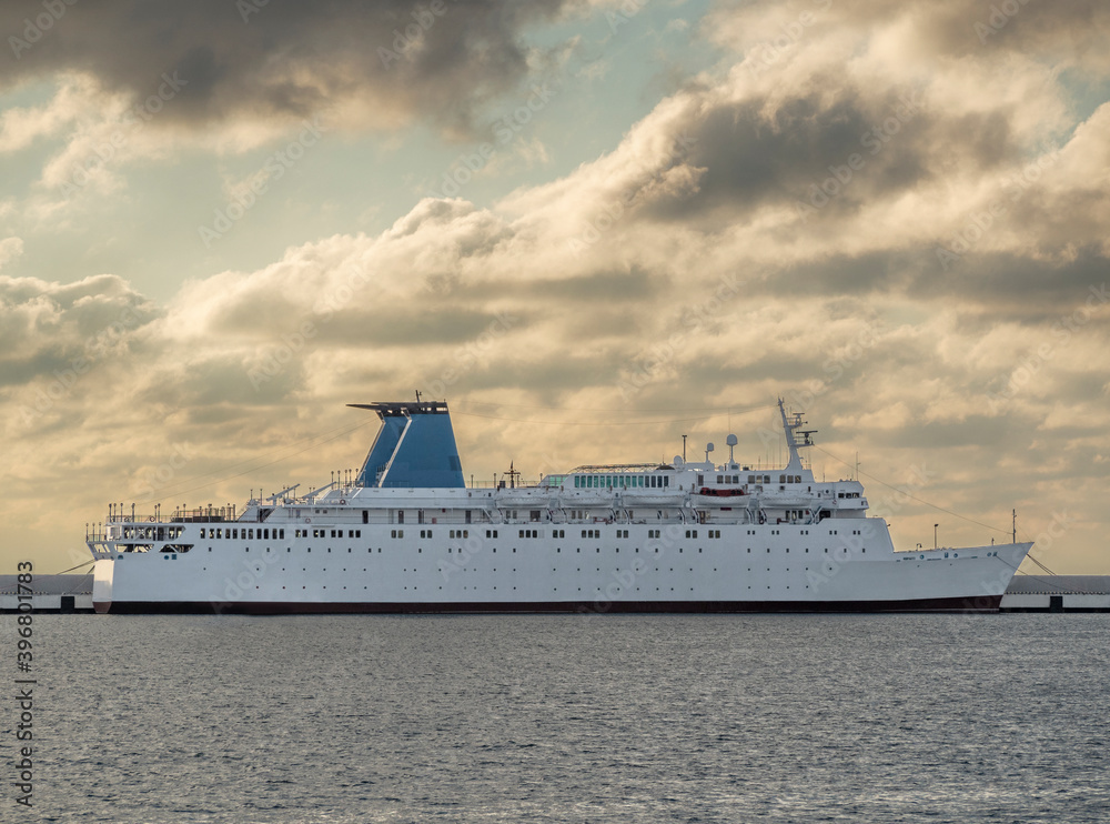 Passenger ship anchored in port. Sea transport for cruise travel