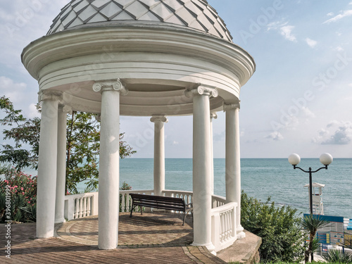 Circular building rotunda at sea background photo