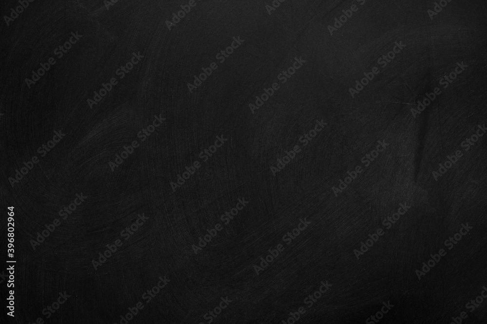 Texture of chalk rubbed out on blackboard or chalkboard background. School education, dark wall backdrop or learning concept.