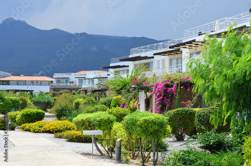Typical architecture in Cyprus. Modern luxury cottages, apartments. beautiful city landscape in background of mountains. © Uixdk