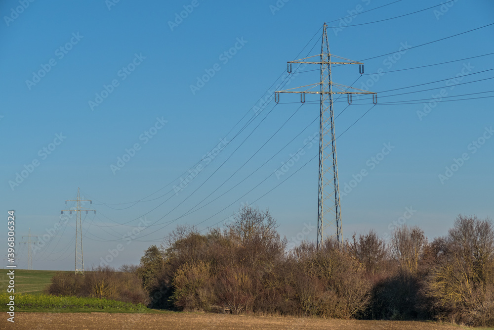 Hochspannungs Masten in herbstlicher Landschaft Hochspannungs Masten in herbstlicher Landschaft