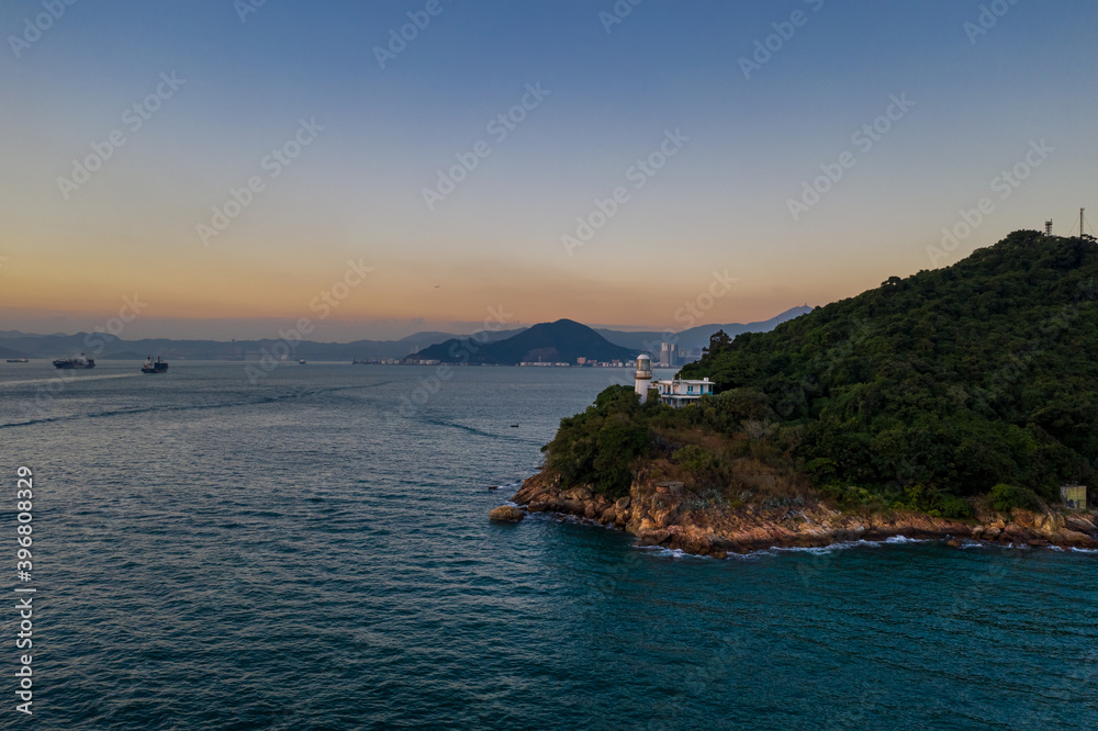 Lighthouse of Victoria Harbour at dusk, Green Island Lighthouse of Victoria Harbour at dusk, Green Island