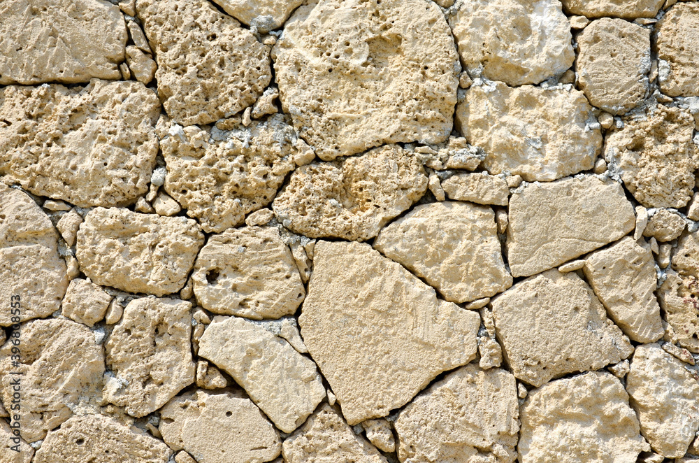 Texture of an old stone wall. Well seen pattern. Texture of an old stone wall. Well seen pattern.
