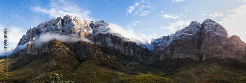 Panorama image of the snowcapped mountains in the Du Toits Kloof pass in the Western Cape South Africa photo