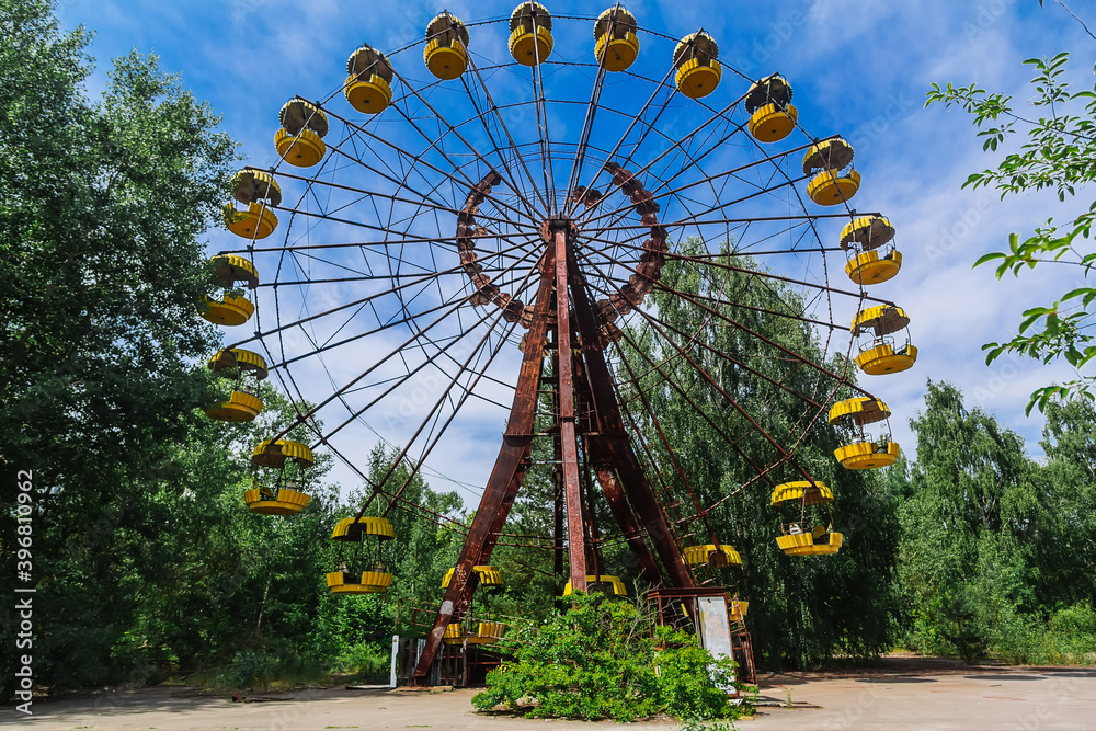 Abandoned Amusement Car Ride in park of attractions in Ghost City of Pripyat in Chernobyl Exclusion Zone