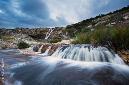 Wide angle view of Tulbagh Waterfall in flow after good winter rains in the Western Cape of South Africa.