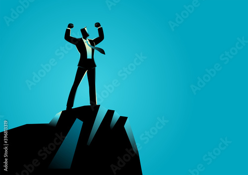 Businessman standing on top of rock