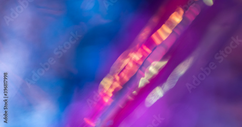Blurred Iridescent neon background.