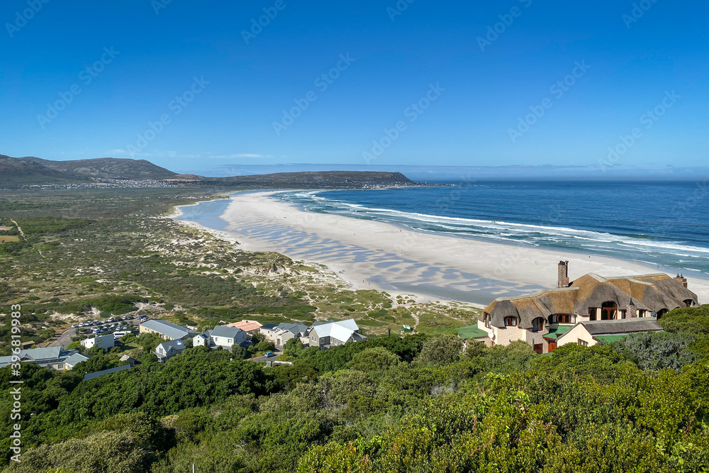 Panorama view of Noordhoek Long Beach near Cape Town, South Africa.