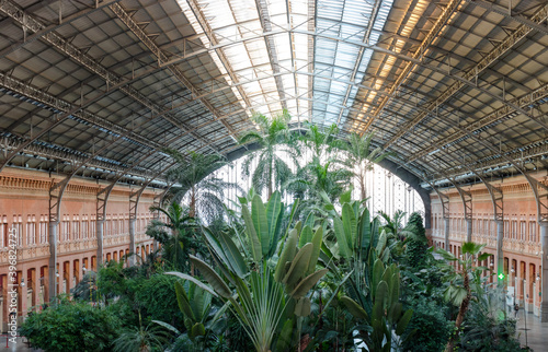Interior of the Atocha railway station in Madrid, Spain. It is the largest station in Madrid
