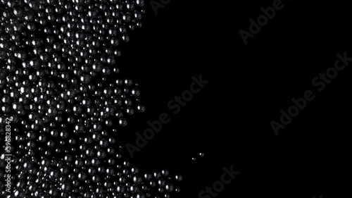 Wave of black shine balls from left side on black background. Glossy spheres fill the volume. Luxury Black caviar flow. 3D render illustration. photo