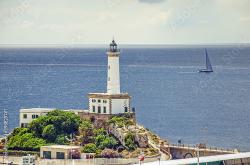 Lighthouse of the port of Ibiza, Spain photo