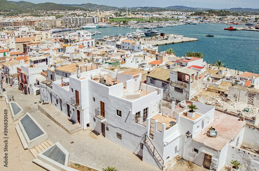 Typical white houses in the old town of Ibiza, Spain