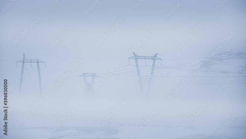 power lines in the fog