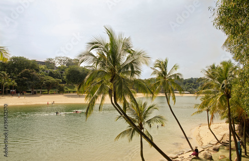  View of Sentosa Palawan Beach. People resting on the shore