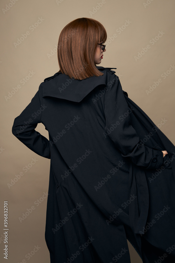 Luxurious lady fashionable clothes bright makeup having fun on an isolated background