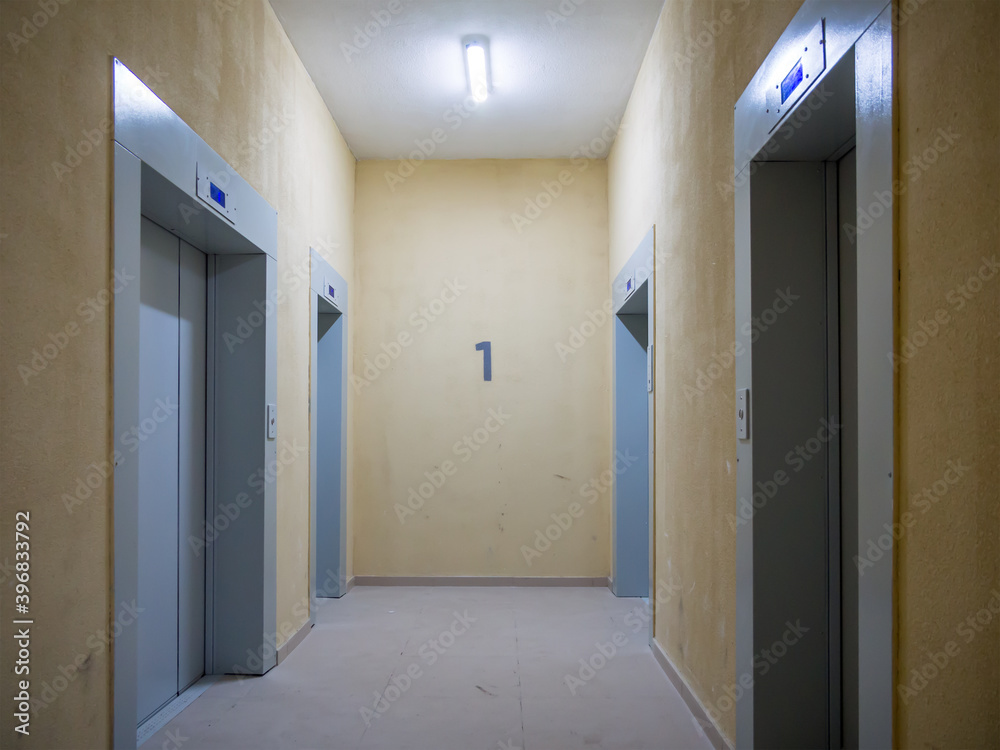 Lift hall with four lifts in a new building Lift hall with four lifts in a new building