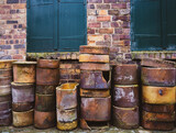 old stone barrels used during firing process of porcelain and stoneware in kiln
