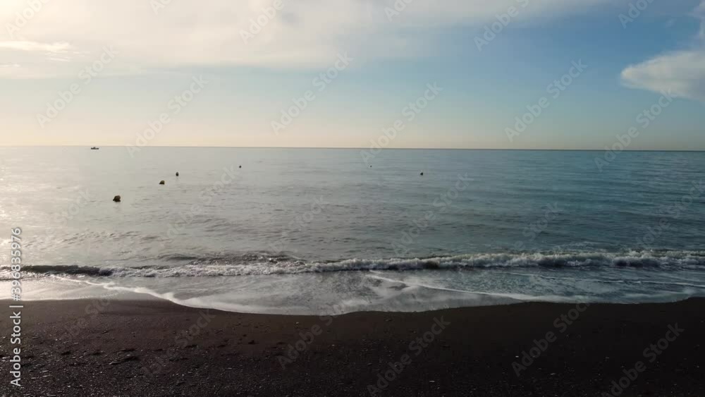 Beautiful top view of the sand beach with wave of Mediterranean Sea . Coastal landscape view of from drone. Dark sand beach. Beautiful top view of the sand beach with wave of Mediterranean Sea . Coastal landscape view of from drone. Dark sand beach.