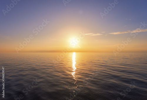 Sunset in the open sea. Aerial view.