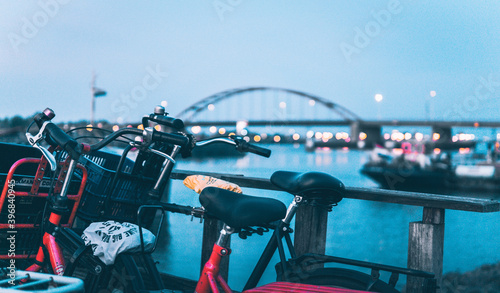 City Bridge  Bikes and the bridge  lights at sunset