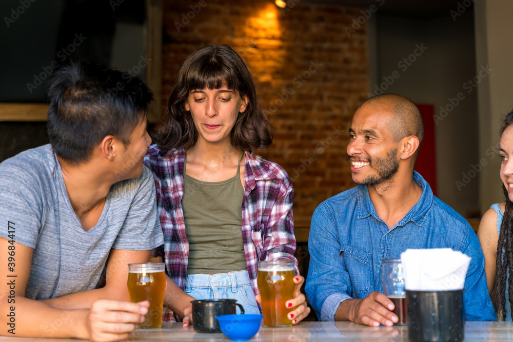 A group of friends having fun together at a barefoot A group of friends having fun together at a barefoot