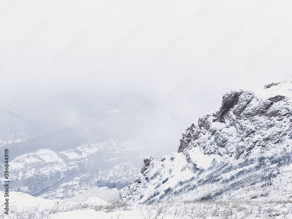 rock in the snow, winter background