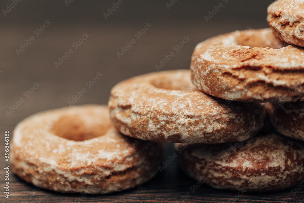 Beautiful Bagels and Gingerbreads Lie on a Brown Background Beautiful Bagels and Gingerbreads Lie on a Brown Background