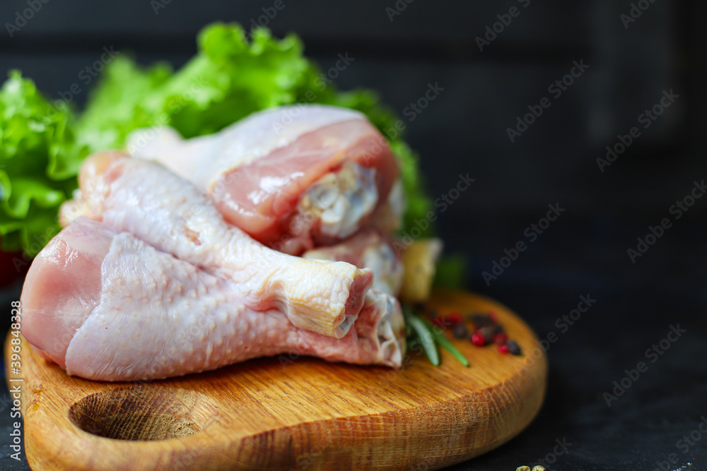 fresh raw chicken drumsticks meat for cooking on the table healthy meal snack top view copy space for text food background rustic keto or paleo diet fresh raw chicken drumsticks meat for cooking on the table healthy meal snack top view copy space for text food background rustic keto or paleo diet