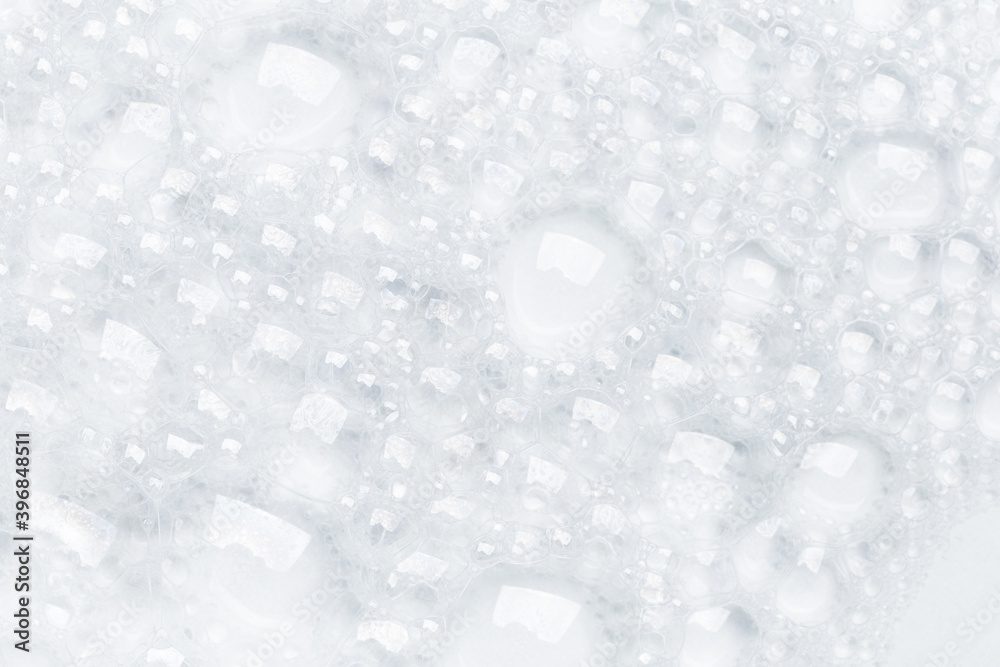 Obraz premium Foam bubble from soap or shampoo for washing isolated on white background from above