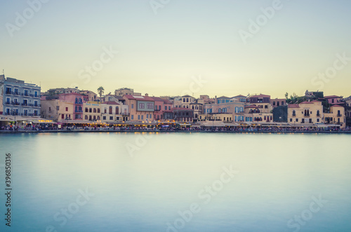 Picturesque view of old harbour of Chania during sunset with silky sea. Crete  Greece.