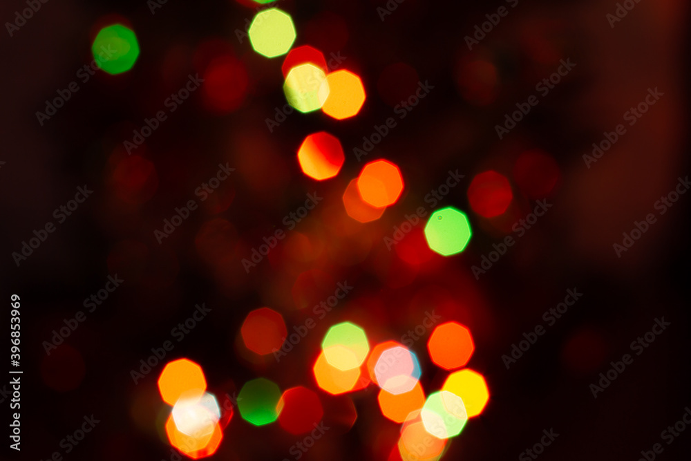 Multicolored bokeh on dark background Multicolored bokeh on dark background