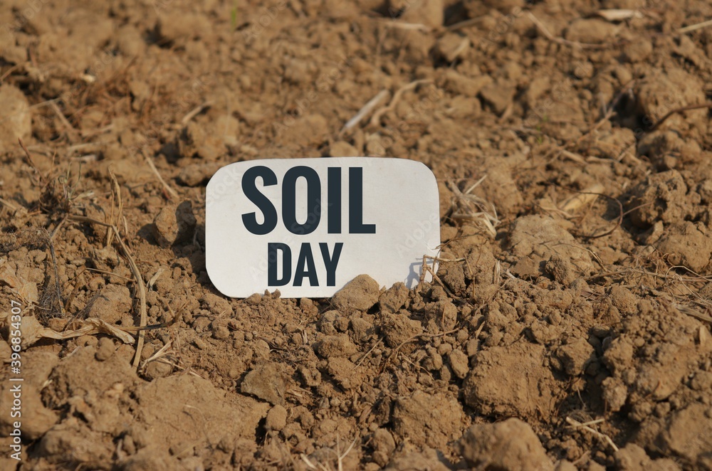 Soil Day Note in Agricultural Land With Selective Focus Soil Day Note in Agricultural Land With Selective Focus