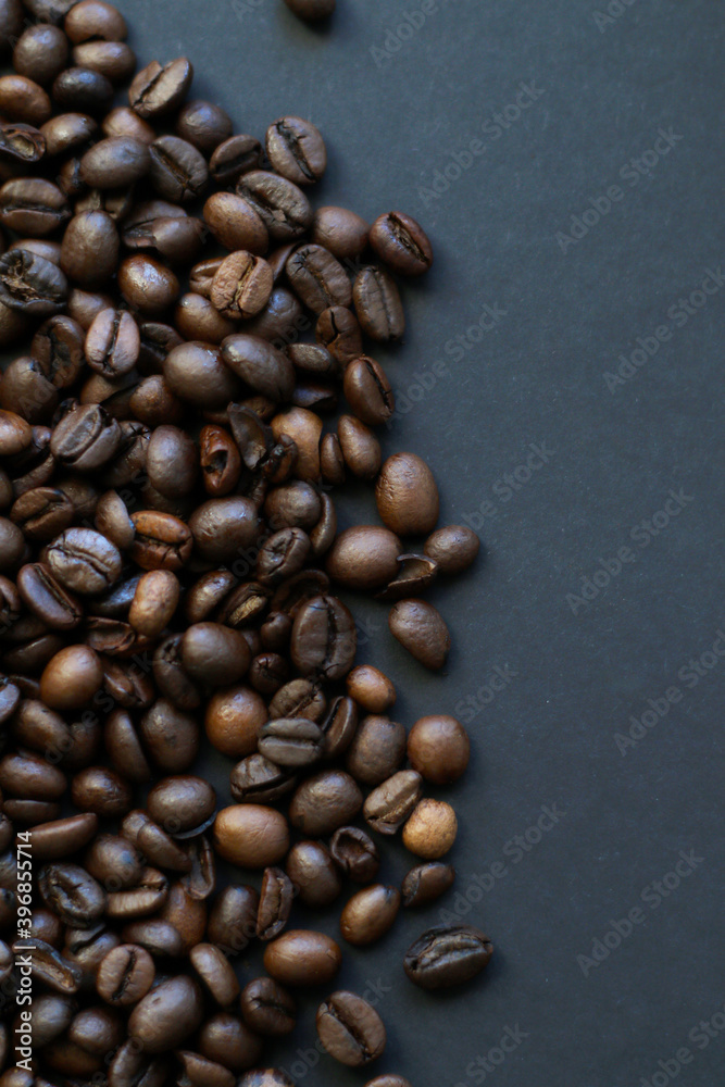 roasted coffee beans on black background roasted coffee beans on black background