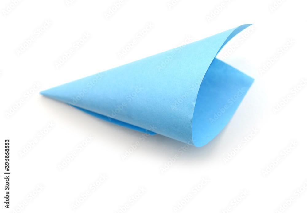 Empty blue paper cone on white Empty blue paper cone on white